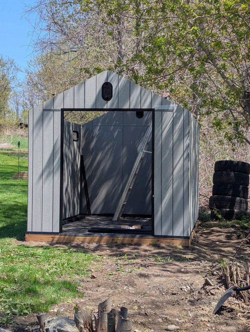 Resin shed fully installed with doors open, The Kawarthas Ontario