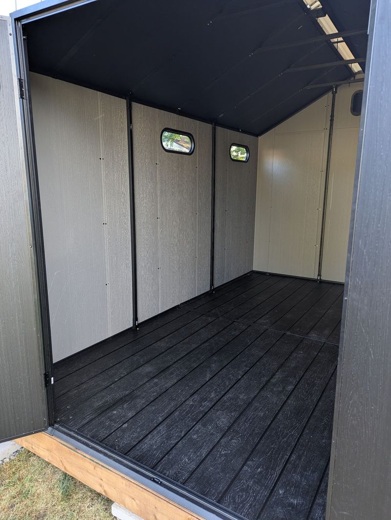 Resin shed interior floor view from doorway in South Ontario